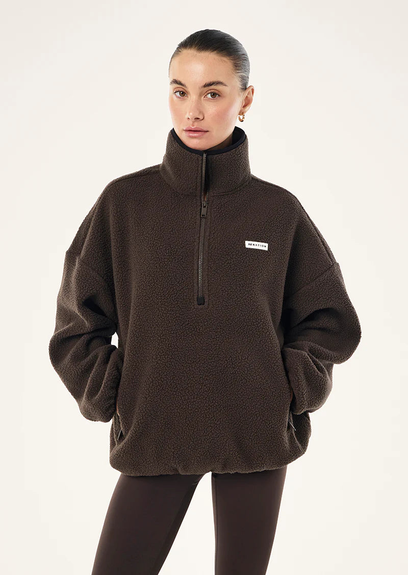 Rotate quarter zip