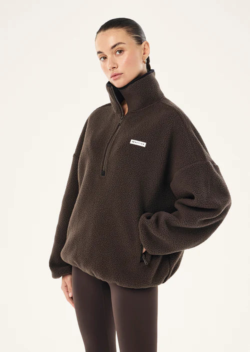 Rotate quarter zip