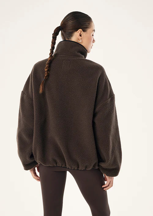 Rotate quarter zip
